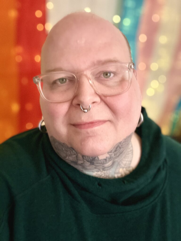 Headshot image of Nomi